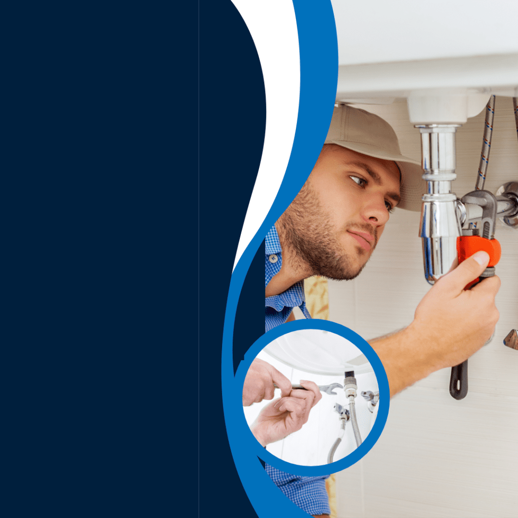 Plumber fixing kitchen sink pipes